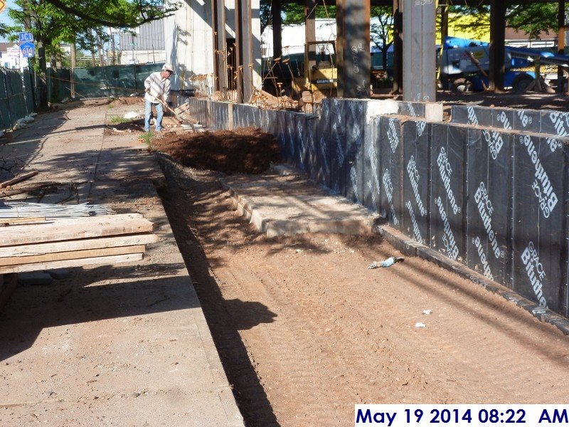 Backfilling and compacting (2nd lift) along foundation walls at column line 1 (E.3-D) Facing West (800x600)